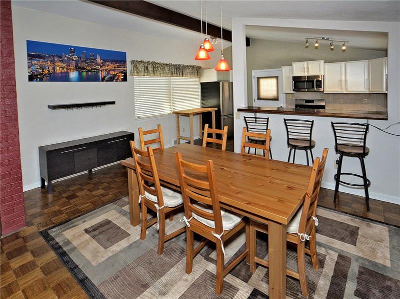 Dining room, directly off kitchen.   Plus counter space to eat.  All SS appliances included, plus Washer and Dryer.  