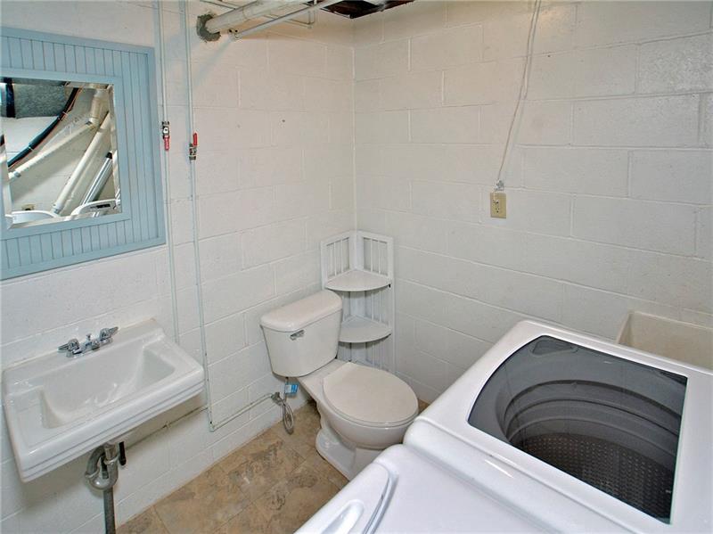 109 Leslie Road Monroeville, PA 15146 - Photo 21 of 24 Half Bath and Laundry Room. Washer and Dryer are included.