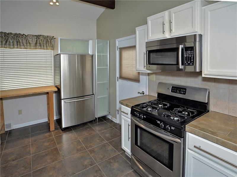 Updated Kitchen area.  SS steel appliances included.  