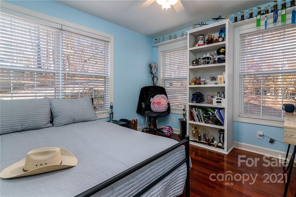 254 Beaten Path Road Mooresville, NC 28117 - Photo 14 of 35 a bedroom with a bed and a window