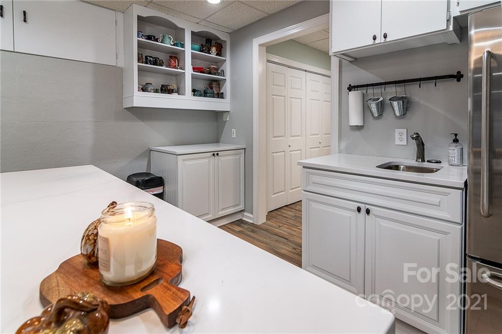 254 Beaten Path Road Mooresville, NC 28117 - Photo 24 of 35 a bathroom with a sink and a mirror