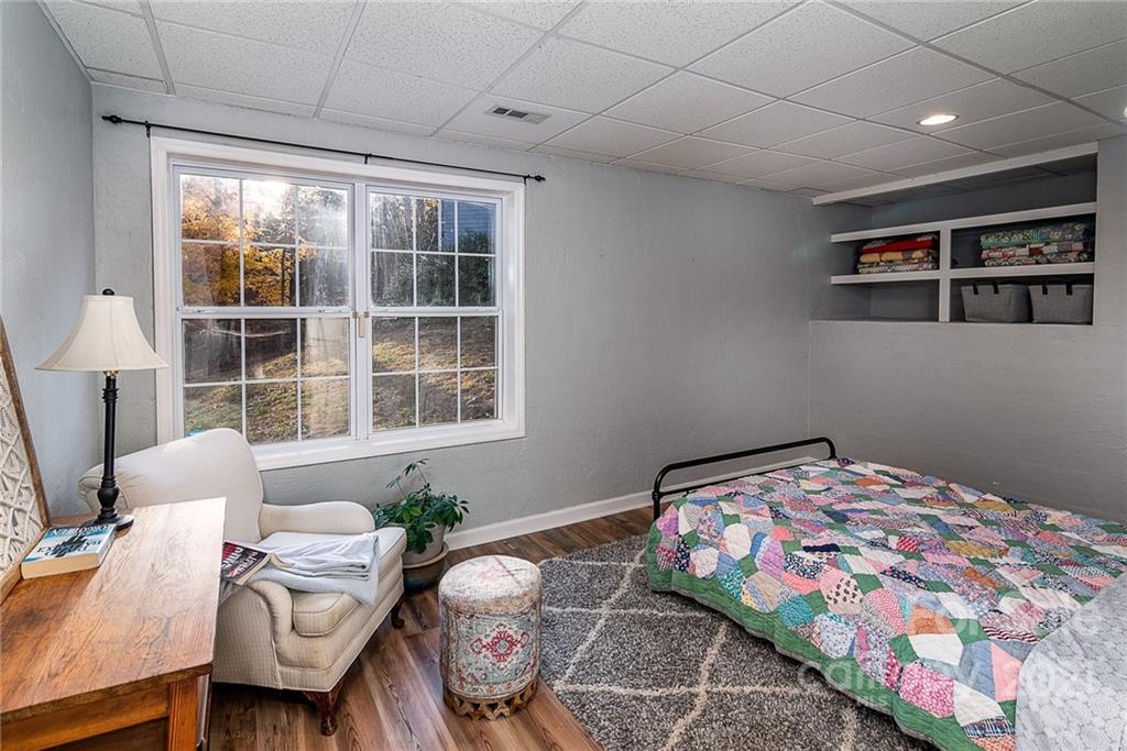 254 Beaten Path Road Mooresville, NC 28117 - Photo 27 of 35 a bedroom with furniture and a window