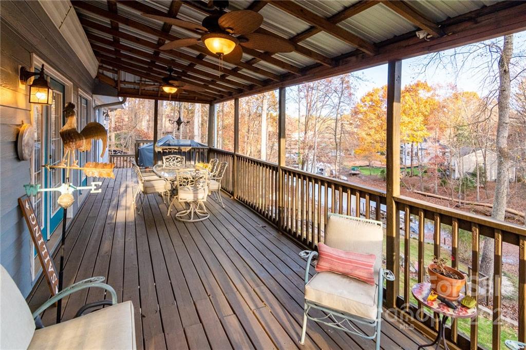 254 Beaten Path Road Mooresville, NC 28117 - Photo 30 of 35 a view of a balcony with chairs