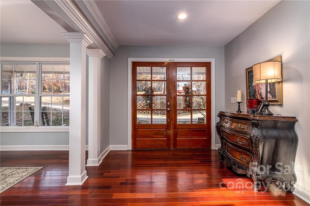 254 Beaten Path Road Mooresville, NC 28117 - Photo 4 of 35 a view of a room with wooden floor and staircase