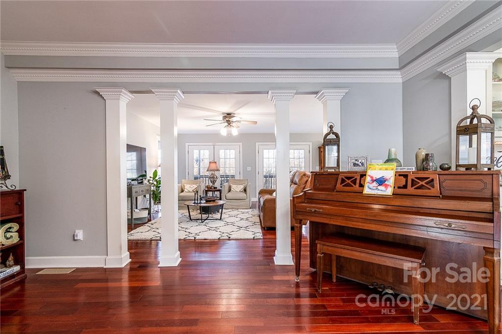 254 Beaten Path Road Mooresville, NC 28117 - Photo 5 of 35 a view of living room with furniture and wooden floor