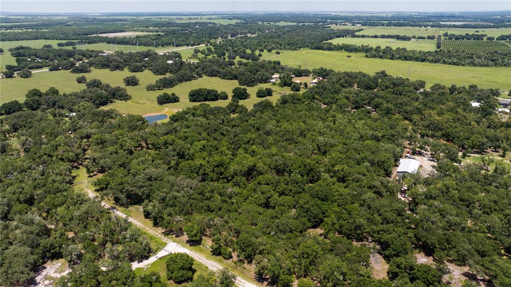 Southeast Brown Road Arcadia, FL 34266 - Photo 16 of 18 an aerial view of residential houses with outdoor space and river