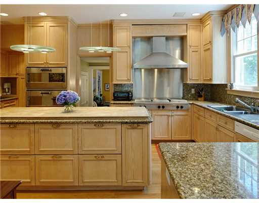 37 Hillside Road Greenwich, CT 06830 - Photo 17 of 18 a kitchen with stainless steel appliances granite countertop a sink and cabinets