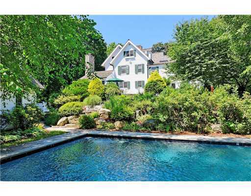 37 Hillside Road Greenwich, CT 06830 - Photo 3 of 18 a view of a big yard with an outdoor seating