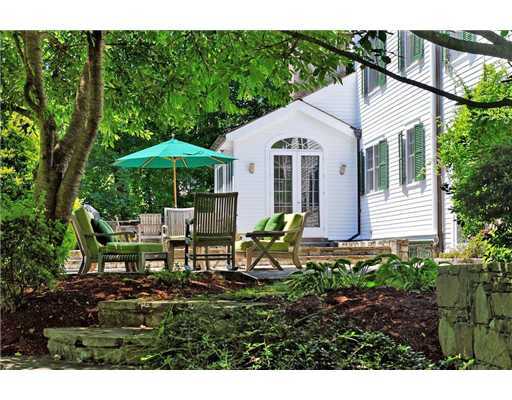 37 Hillside Road Greenwich, CT 06830 - Photo 9 of 18 a view of a house with backyard sitting area and garden