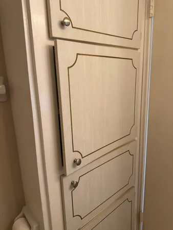 a kitchen with a sink and refrigerator