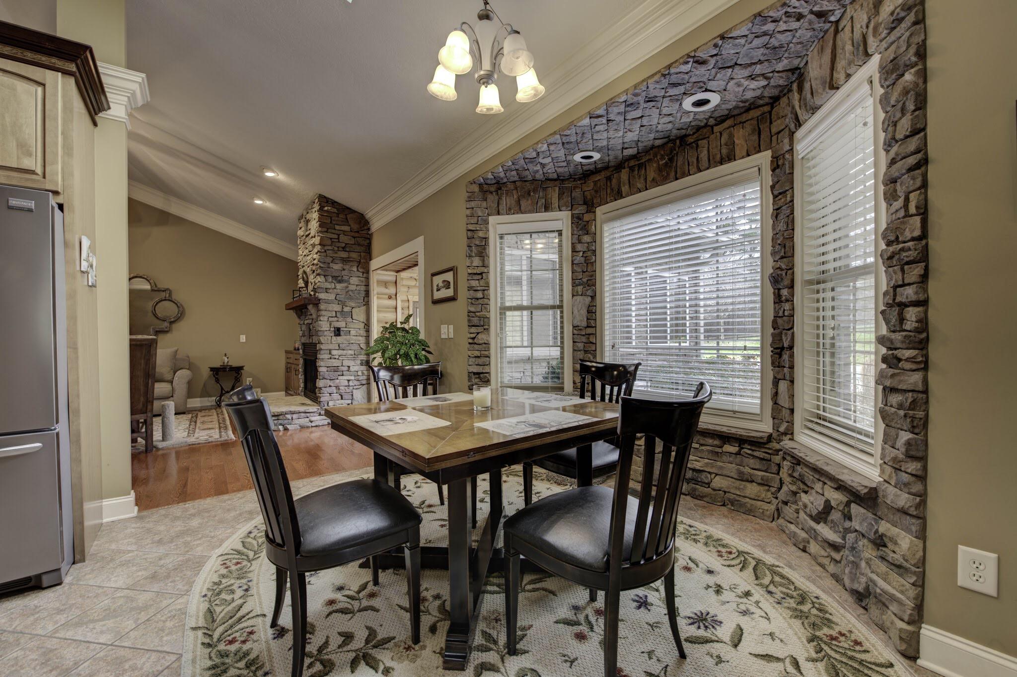 5733 Maloneyville Road Corryton, TN 37721 - Photo 25 of 40 Breakfast Room with stone accents