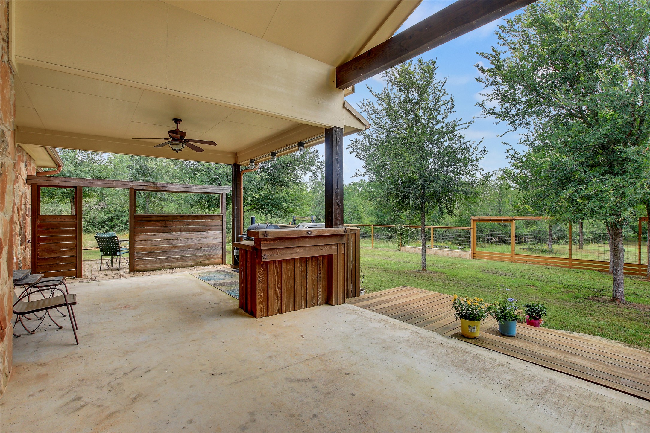 18197 Fm 619 Elgin, TX 78621 - Photo 28 of 39 a view of a porch with furniture and garden