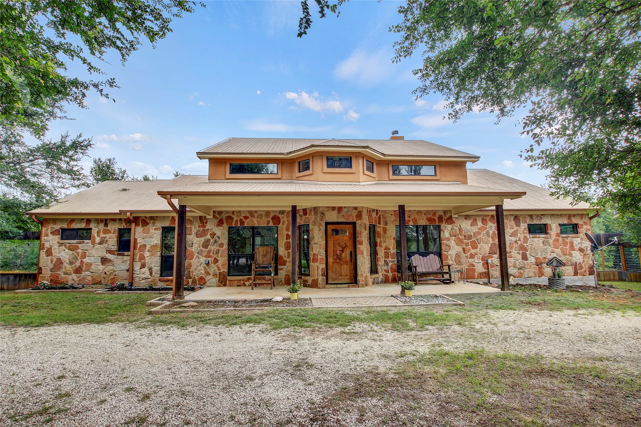 18197 Fm 619 Elgin, TX 78621 - Photo 4 of 39 a front view of a house with garden