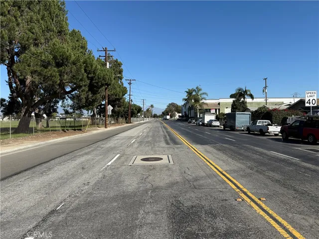 a view of a street with cars