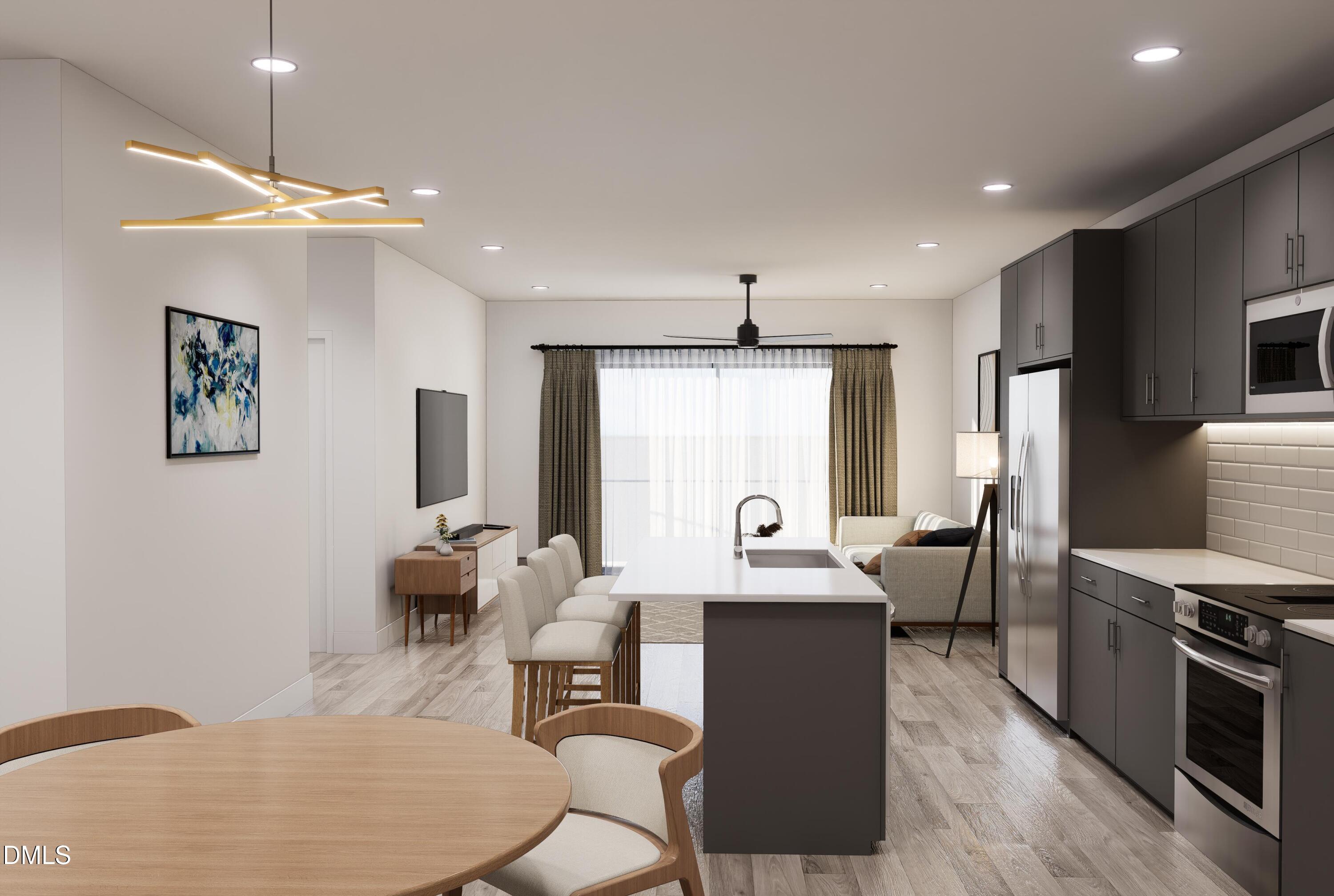 709 East Lenoir Street, Unit 304 Raleigh, NC 27601 - Photo 2 of 11 a living room with furniture a large window and a flat screen tv