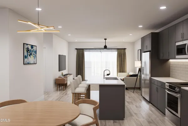 a living room with furniture a large window and a flat screen tv