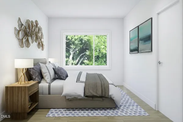 a living room with a couch and a window