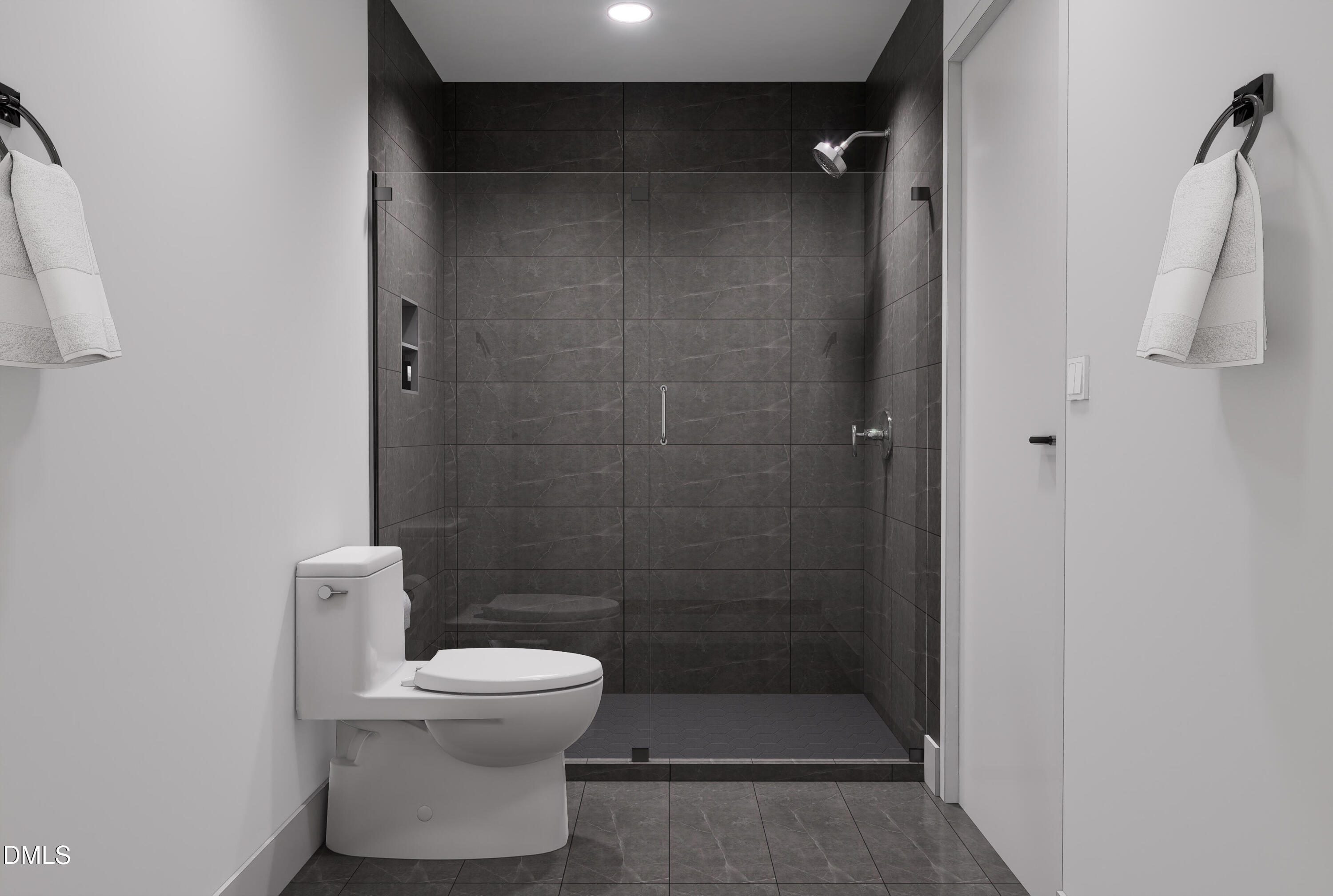 709 East Lenoir Street, Unit 304 Raleigh, NC 27601 - Photo 6 of 11 a bathroom with a toilet and a shower