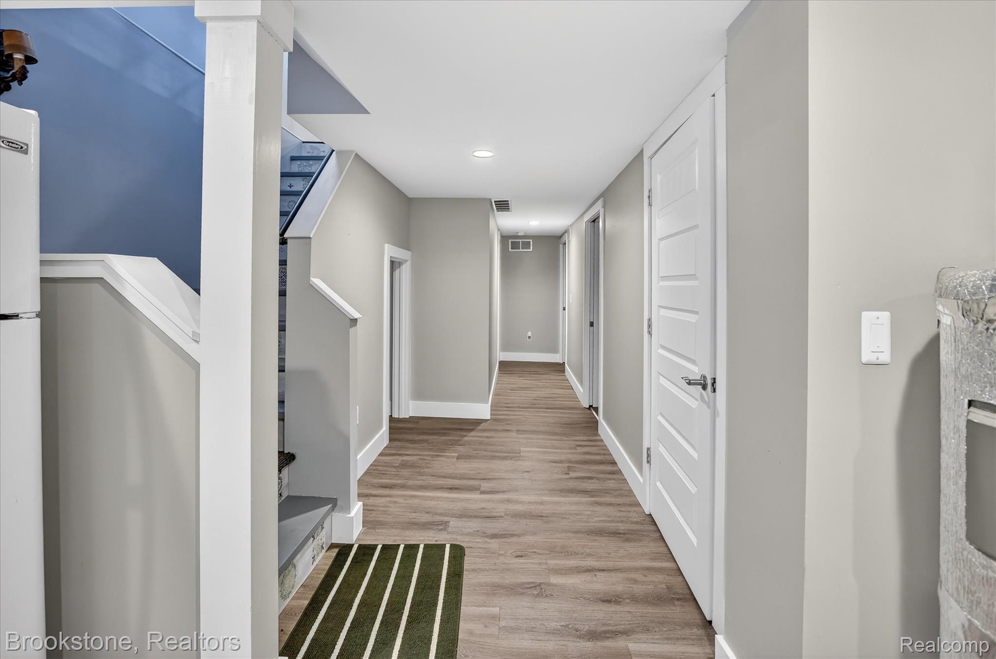 2450 North Lakeshore Road Carsonville, MI 48419 - Photo 19 of 27 Hallway featuring light wood finished floors and recessed lighting