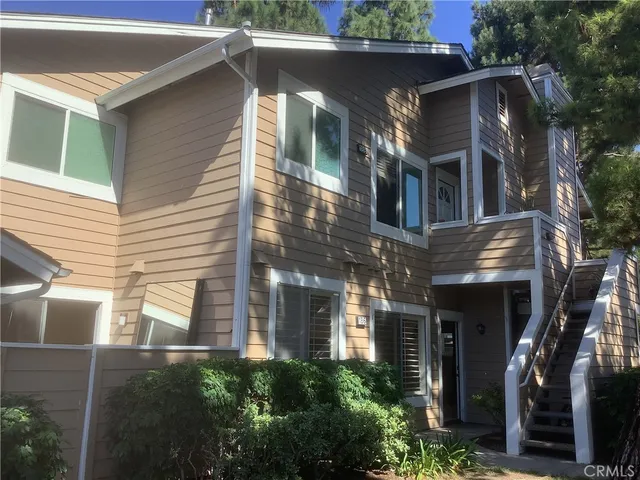 a view of a house with a garage