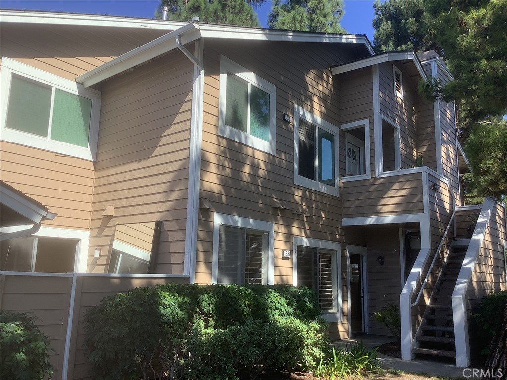 186 Monroe Irvine, CA 92620 - Photo 2 of 12 a view of a house with a garage