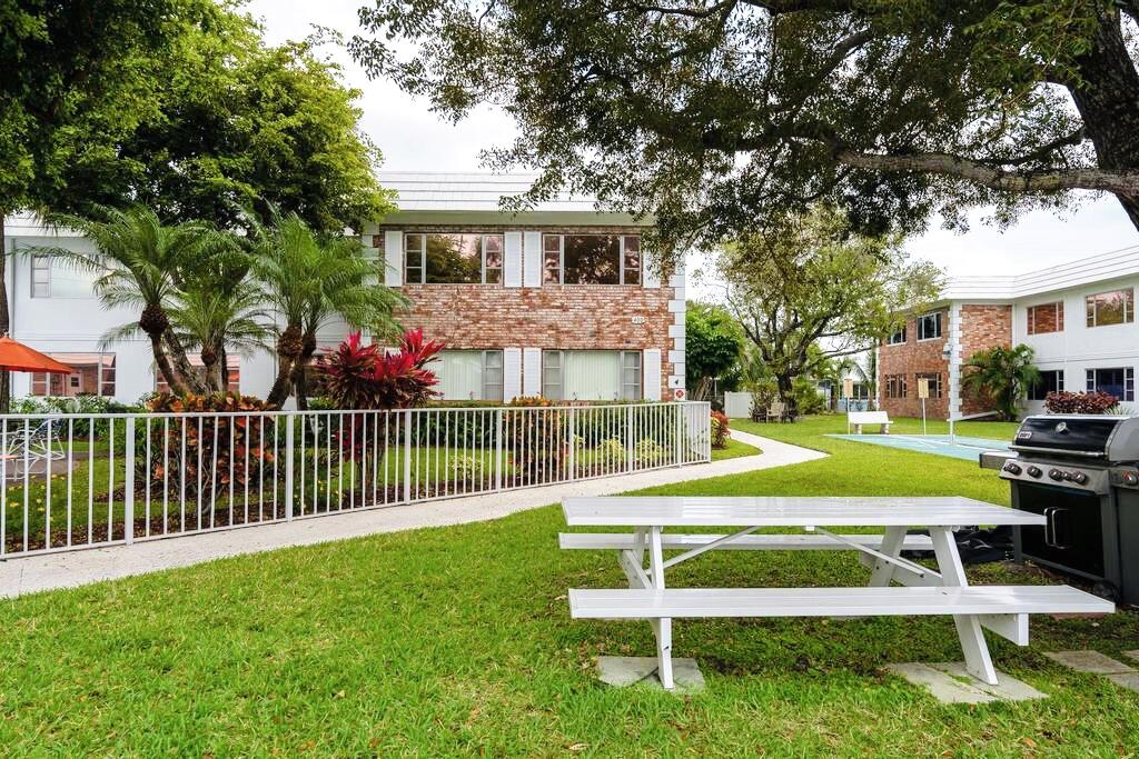 400 South Cypress Road, Unit 424 Pompano Beach, FL 33060 - Photo 7 of 40 a view of a house with a yard porch and sitting area