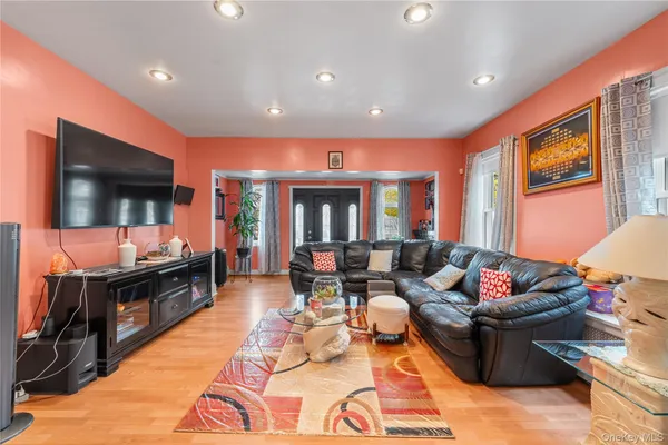 a kitchen with stainless steel appliances a stove a sink and a refrigerator