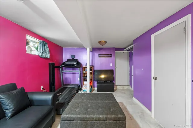 a view of a house with a backyard and sitting area