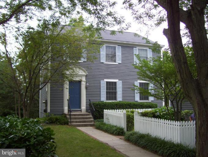 7375 Kindler Road Columbia, MD 21046 - Photo 1 of 27 a front view of a house with a garden