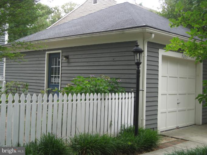 7375 Kindler Road Columbia, MD 21046 - Photo 13 of 27 a front view of a house with a garden