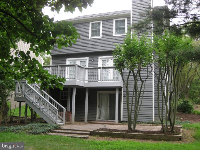 7375 Kindler Road Columbia, MD 21046 - Photo 14 of 27 a front view of a house with a yard