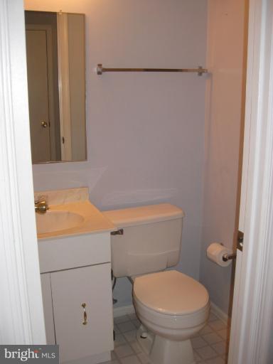 7375 Kindler Road Columbia, MD 21046 - Photo 21 of 27 a bathroom with a toilet and a shower
