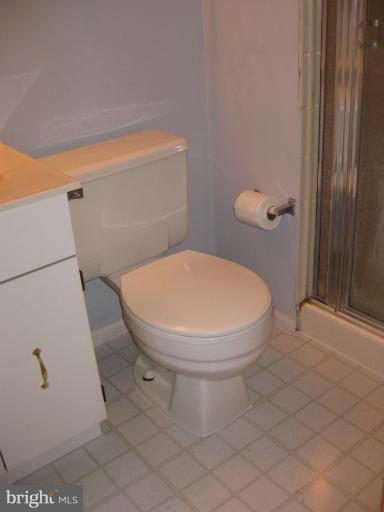 7375 Kindler Road Columbia, MD 21046 - Photo 23 of 27 a bathroom with a toilet and a sink