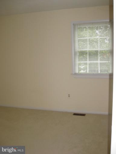 7375 Kindler Road Columbia, MD 21046 - Photo 7 of 27 a view of an empty room with a window