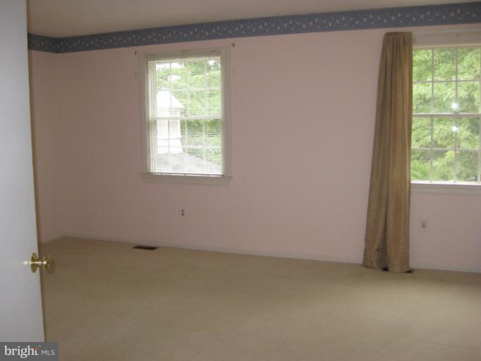 7375 Kindler Road Columbia, MD 21046 - Photo 10 of 27 an empty room with a window