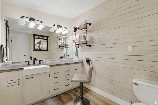 114 North Clark Lane Elk Ridge, UT 84651 - Photo 13 of 26 Double vanity with concrete-finish countertop, undermount sink, and matte black fixtures