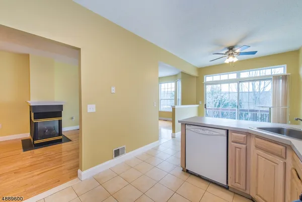 a kitchen with cabinets a sink and appliances
