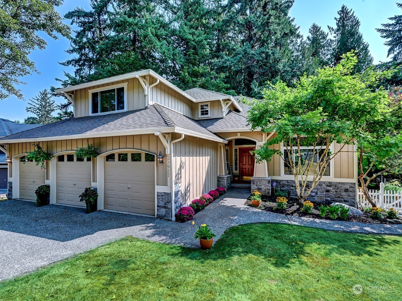 23927 30th Drive Southeast Bothell, WA 98021 - Photo 1 of 32 a front view of a house with a yard