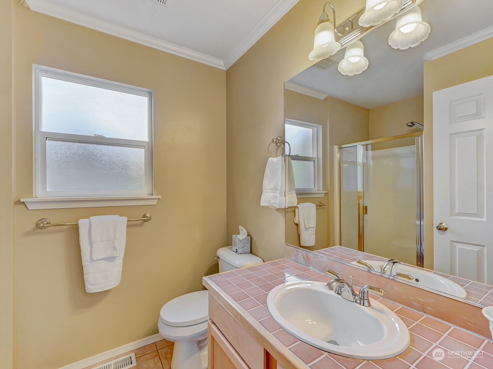 23927 30th Drive Southeast Bothell, WA 98021 - Photo 13 of 32 a bathroom with a sink a toilet and a mirror