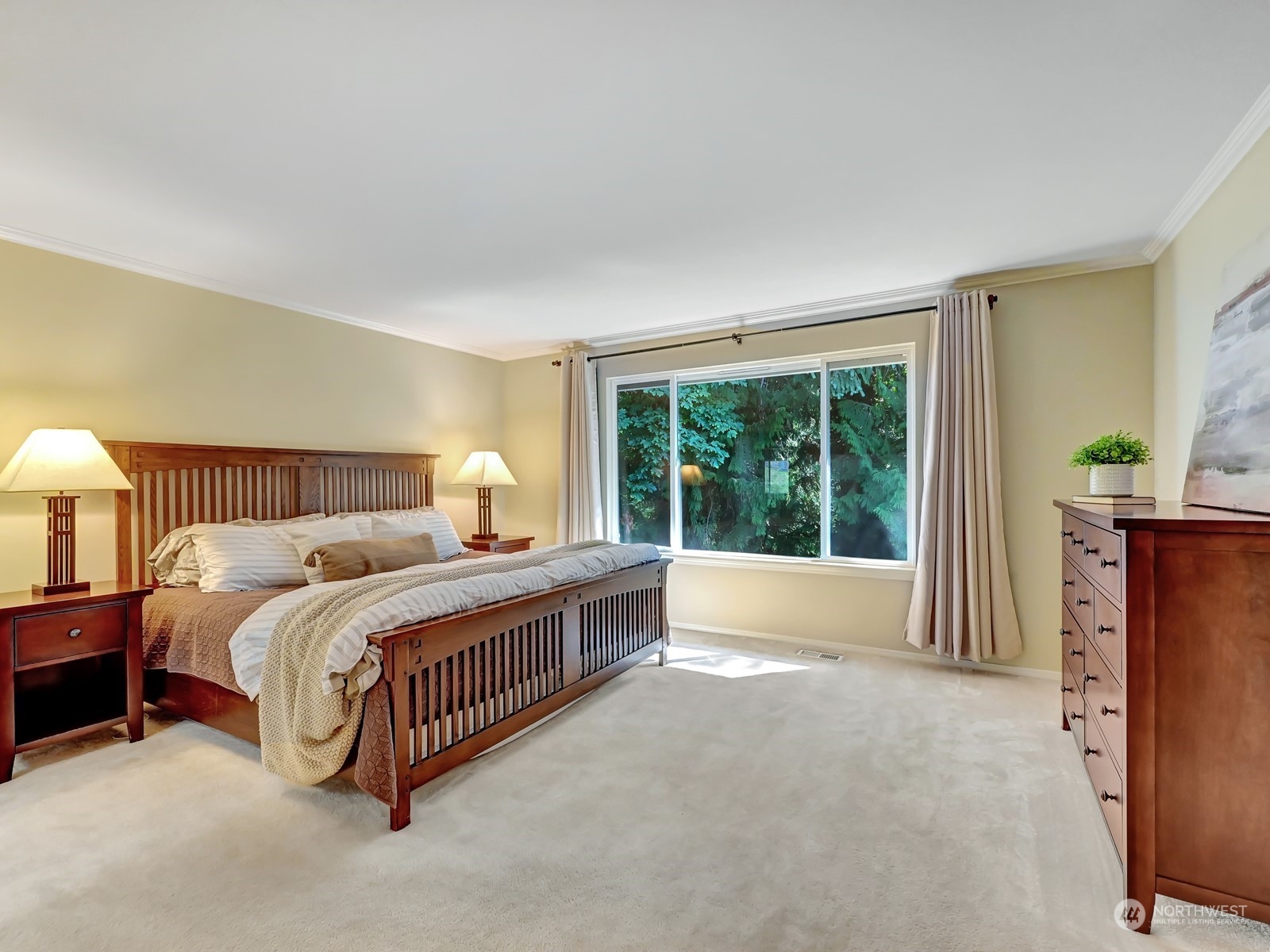 23927 30th Drive Southeast Bothell, WA 98021 - Photo 16 of 32 a bed room with a bed and a lamp
