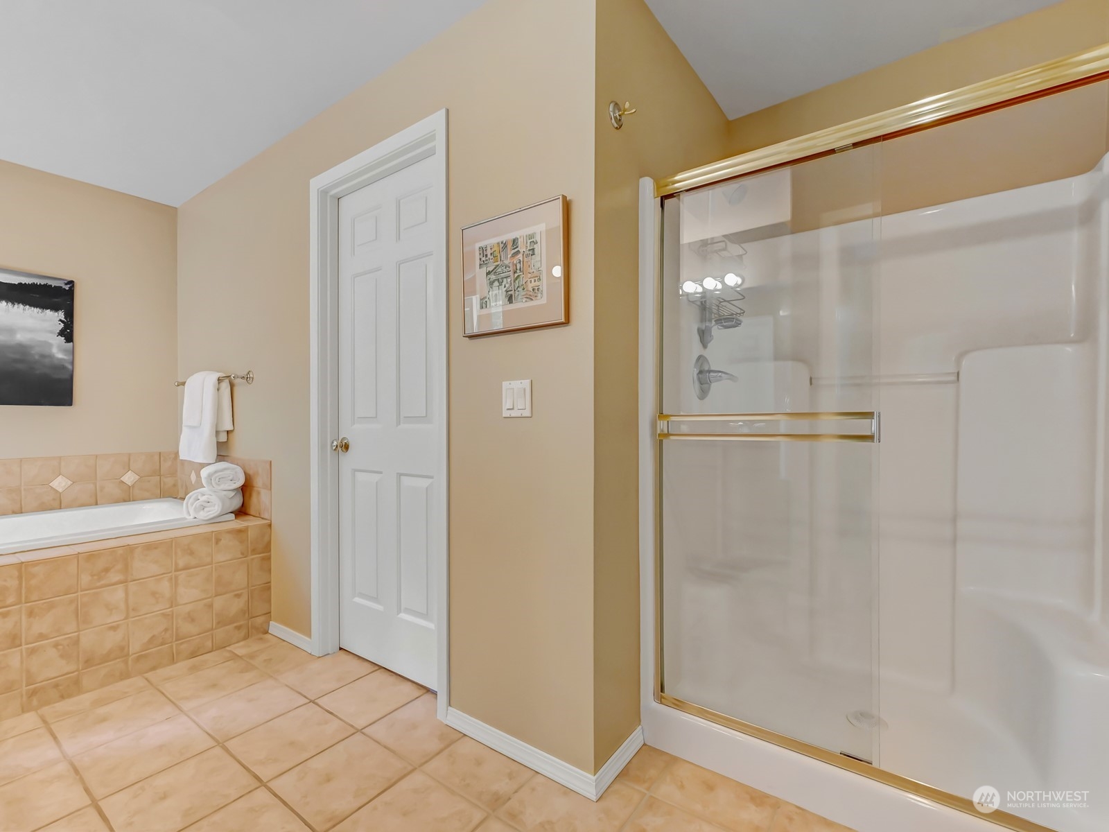 23927 30th Drive Southeast Bothell, WA 98021 - Photo 18 of 32 a bathroom with a bathtub and a shower