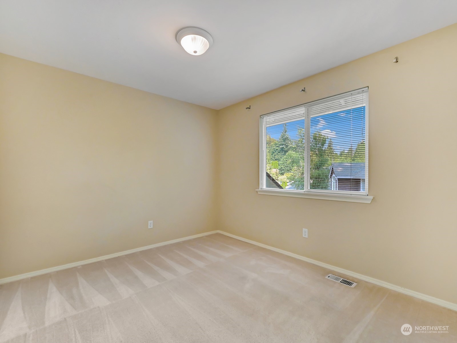 23927 30th Drive Southeast Bothell, WA 98021 - Photo 21 of 32 an empty room with windows
