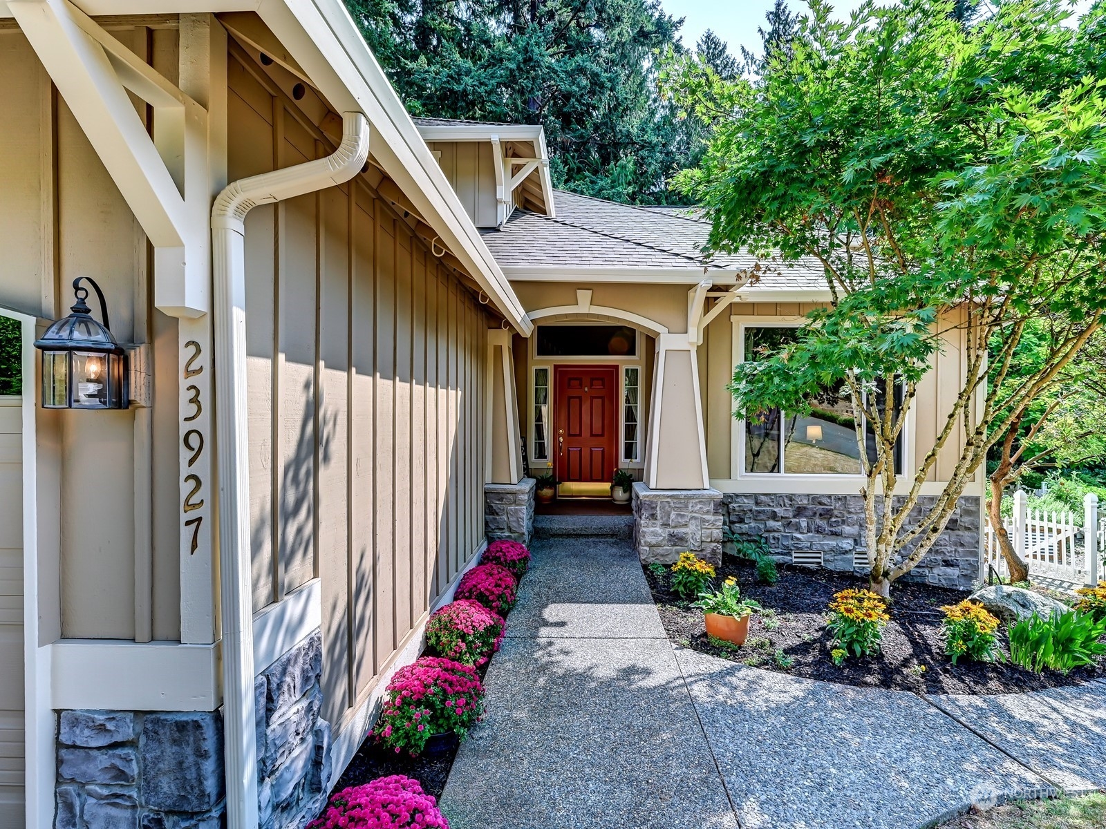 23927 30th Drive Southeast Bothell, WA 98021 - Photo 24 of 32 a front view of a house with outdoor seating