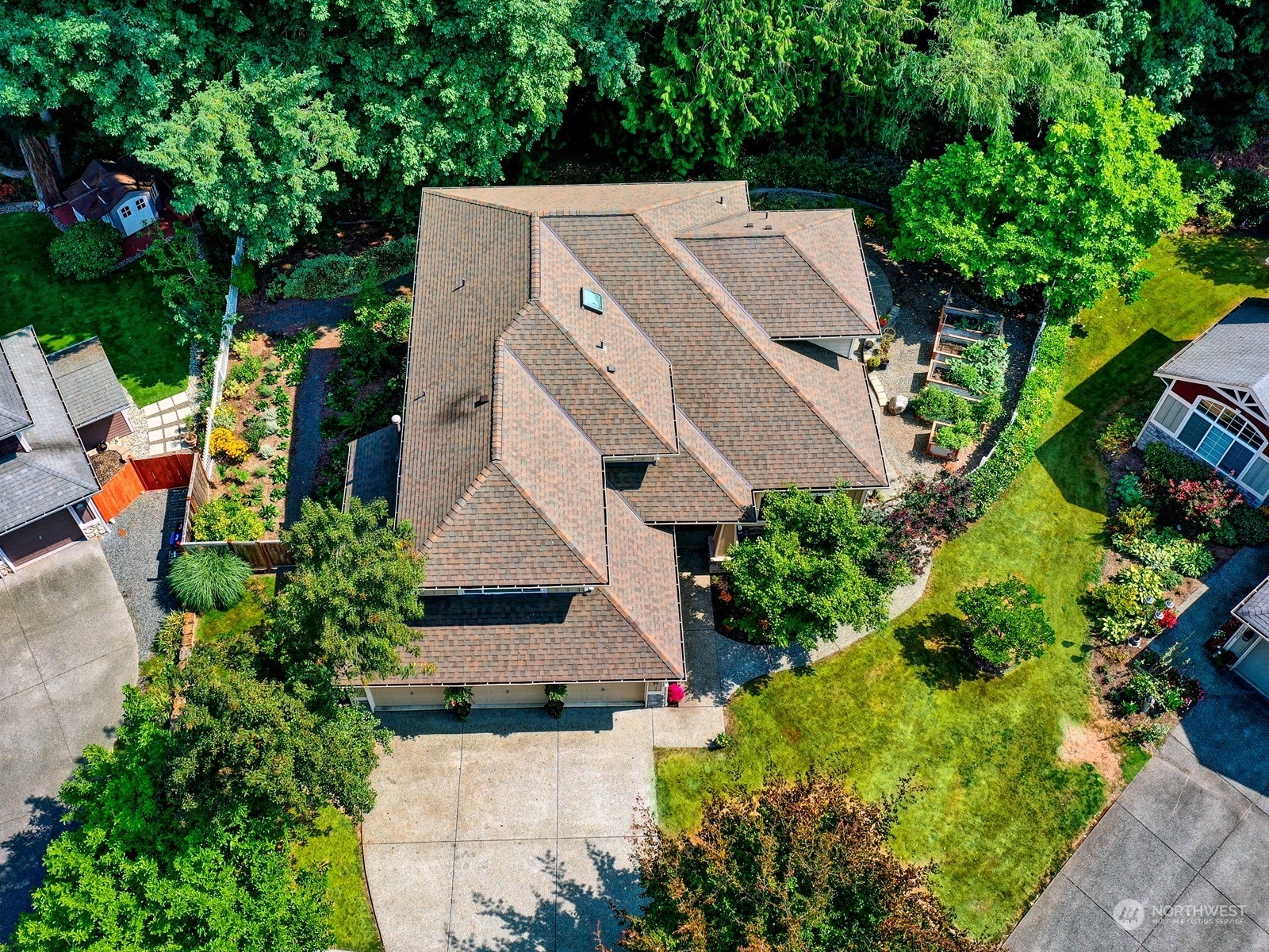 23927 30th Drive Southeast Bothell, WA 98021 - Photo 28 of 32 an aerial view of a house with a yard and large trees