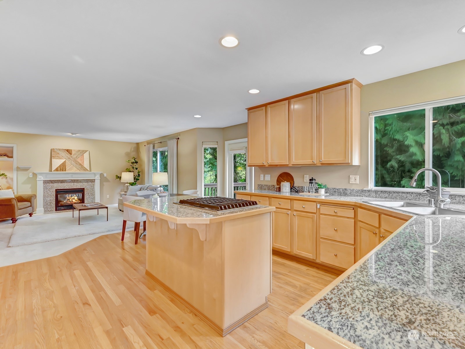 23927 30th Drive Southeast Bothell, WA 98021 - Photo 8 of 32 a large kitchen with lots of counter top space and stainless steel appliances