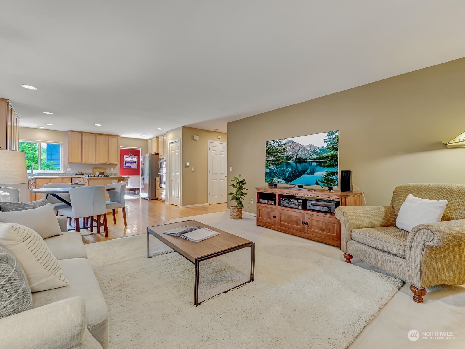 23927 30th Drive Southeast Bothell, WA 98021 - Photo 10 of 32 a living room with furniture and a flat screen tv