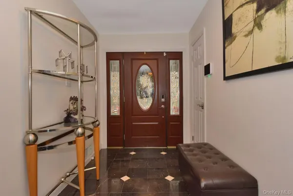 a view of a workspace with furniture