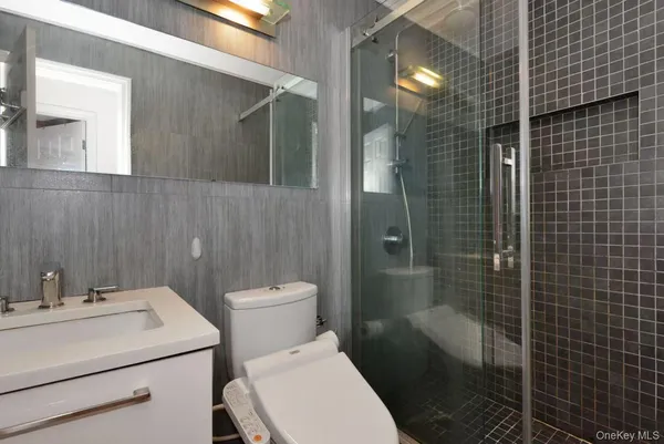 a kitchen with a sink stainless steel appliances and cabinets