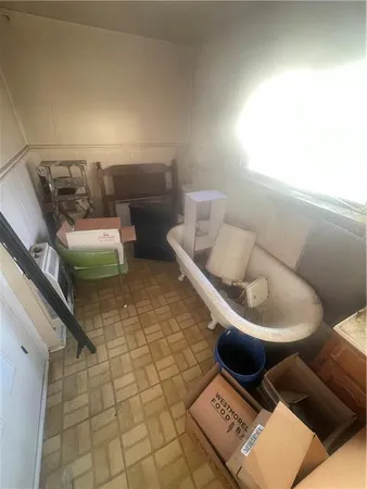 a bathroom with a toilet and a sink