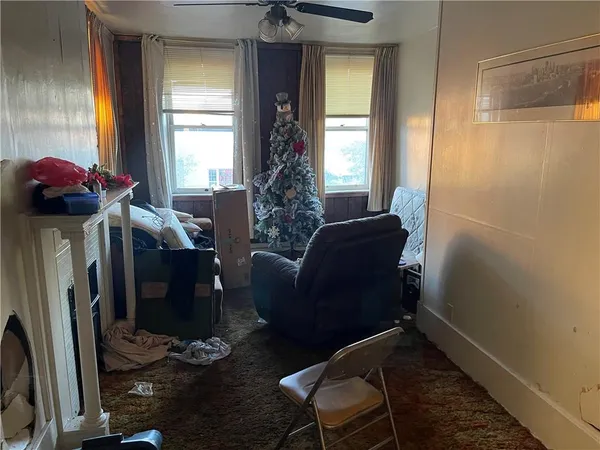 a living room with furniture and a window